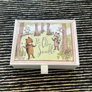 Ollie swaddle- 2 for sale, blue and green